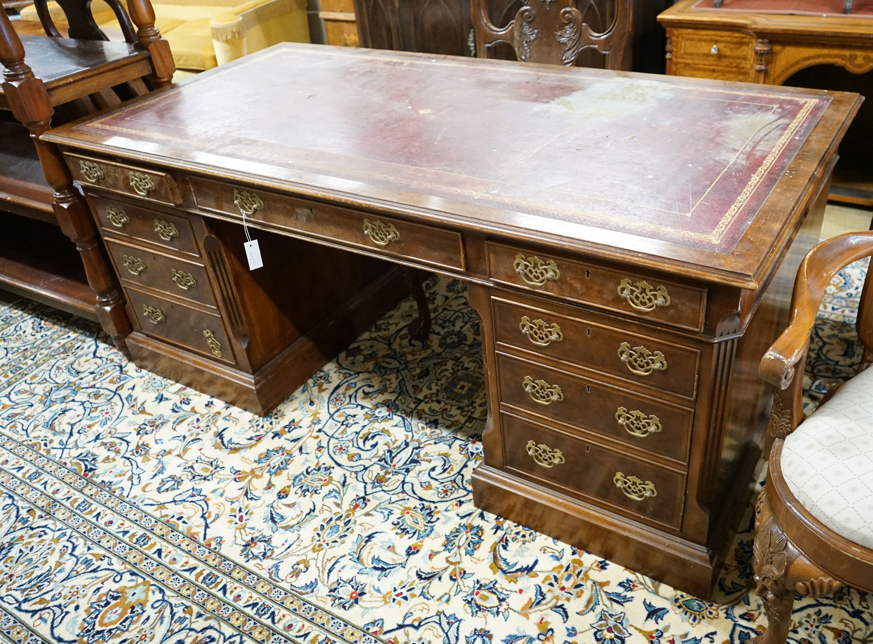 A George III style mahogany pedestal partner's desk, length 182cm, depth 91cm, height 76cm